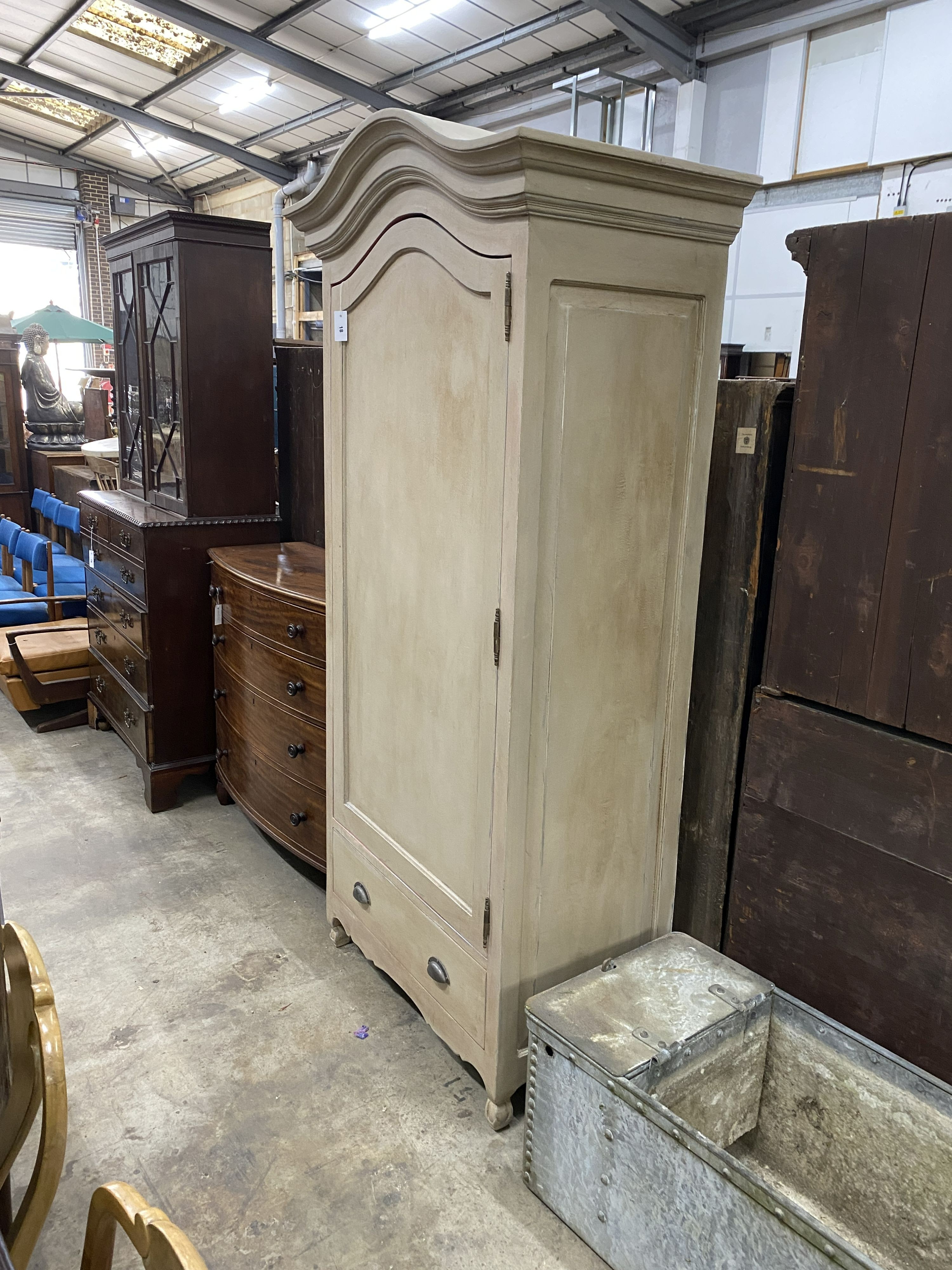 A Louis XV style white painted armoire, width 104cm, depth 58cm, height 216cm